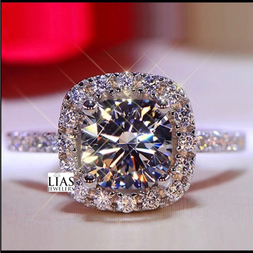 New 18k white gold engagement ring